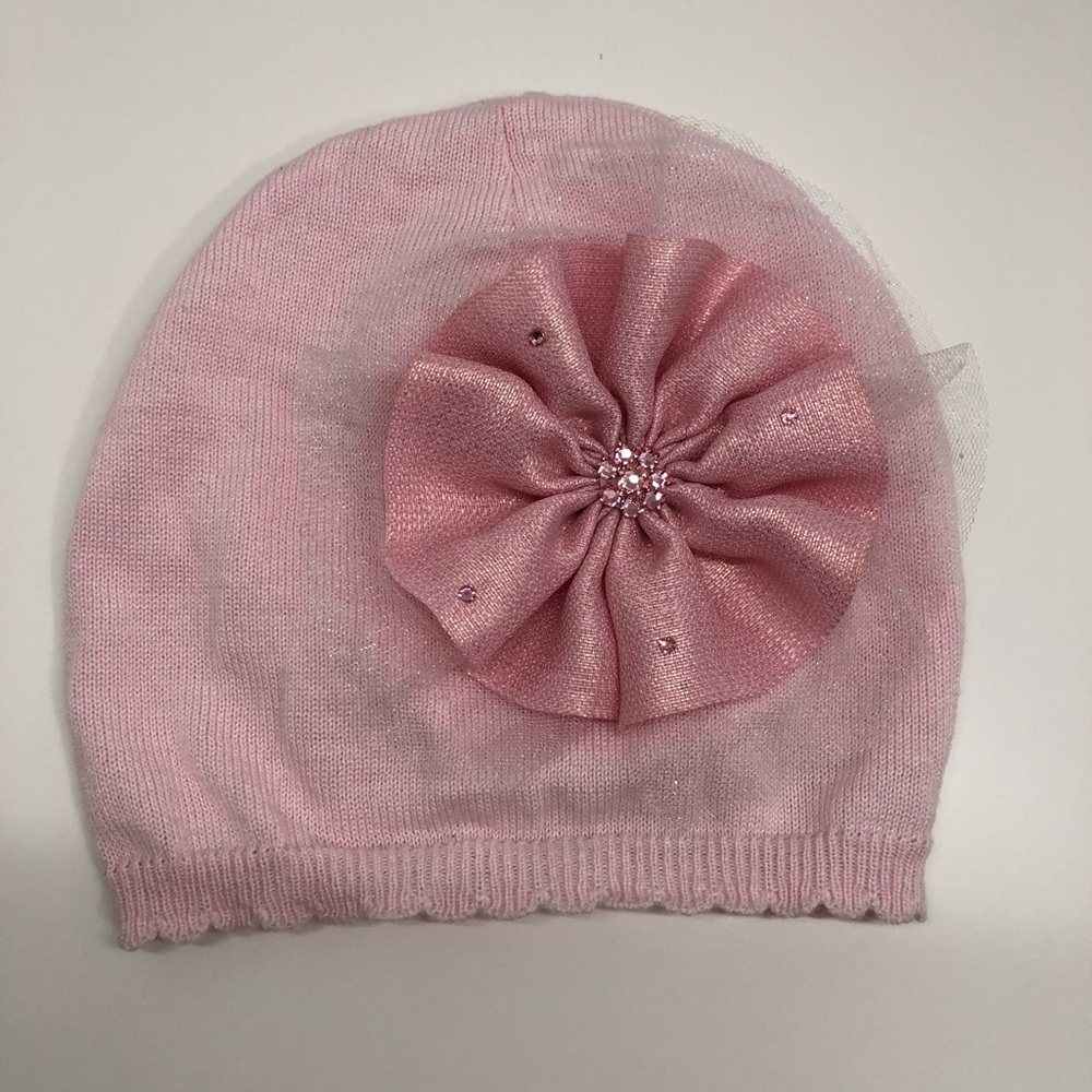 Light Pink Hat with Bow Embellishment.